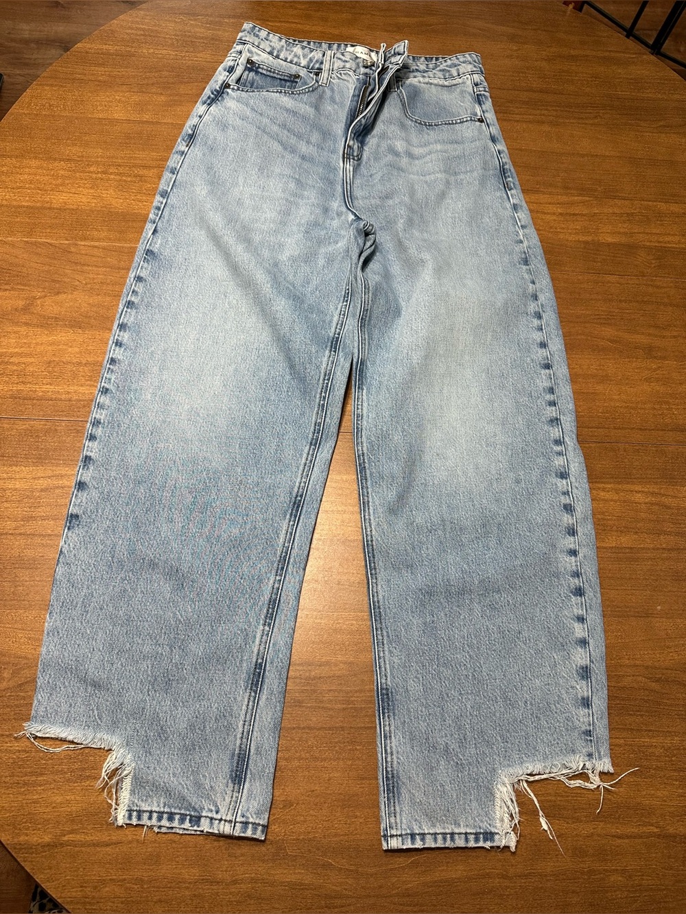 Frame Denim Light Blue Boyfriend Jeans with Frayed Hem